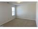 Bedroom featuring carpet flooring and a window with natural light at 1238 Polk Xing, Mcdonough, GA 30252