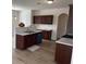 Kitchen view featuring modern cabinets, stainless appliances and updated granite countertops at 1238 Polk Xing, Mcdonough, GA 30252