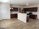 Updated kitchen featuring stainless steel appliances, granite countertops and lots of storage at 1238 Polk Xing, Mcdonough, GA 30252