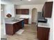 Well-designed kitchen with stainless appliances, a breakfast bar, and ample cabinet space at 1238 Polk Xing, Mcdonough, GA 30252