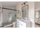 Modern bathroom with a glass-enclosed shower, white vanity, and contemporary fixtures, creating a serene and stylish space at 4023 Anvil Block Rd, Ellenwood, GA 30294