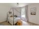 Serene bedroom with a canopy bed, soft lighting, and peaceful decor at 4023 Anvil Block Rd, Ellenwood, GA 30294