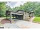 Covered carport with concrete driveway on a single-story home at 4023 Anvil Block Rd, Ellenwood, GA 30294