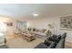 Spacious living room with modern furniture, stylish décor, and hardwood floors at 4023 Anvil Block Rd, Ellenwood, GA 30294