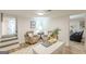 Home office with modern decor including two armchairs, a desk, and stylish light fixtures at 4023 Anvil Block Rd, Ellenwood, GA 30294