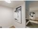 Stairwell with modern art and neutral color palette leading up at 4023 Anvil Block Rd, Ellenwood, GA 30294