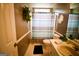 Bathroom with shower, toilet, sink, and vanity with ample counter space at 155 Granby Ln, Fayetteville, GA 30215
