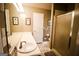 Modern bathroom featuring a shower, vanity with sink, and a separate water closet at 155 Granby Ln, Fayetteville, GA 30215