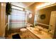 Cozy bathroom with a shower-tub combo and neutral-colored walls at 155 Granby Ln, Fayetteville, GA 30215