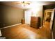 Bedroom with hardwood floors, closet, and view to the hallway at 155 Granby Ln, Fayetteville, GA 30215