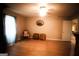 Bright bedroom with hardwood floors, a window with curtains, and ample closet space at 155 Granby Ln, Fayetteville, GA 30215