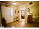 Inviting foyer with hardwood floors and a view into the dining room at 155 Granby Ln, Fayetteville, GA 30215