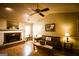 Bright living room with hardwood floors, vaulted ceilings, and comfortable seating at 155 Granby Ln, Fayetteville, GA 30215