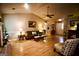 Spacious living room with vaulted ceilings, wood floors, a cozy sofa, and a ceiling fan at 155 Granby Ln, Fayetteville, GA 30215