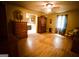 Spacious main bedroom with hardwood floors, a ceiling fan, and ensuite access at 155 Granby Ln, Fayetteville, GA 30215