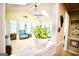 Sunroom view, showing multiple windows and skylights, as well as views to living room at 155 Granby Ln, Fayetteville, GA 30215
