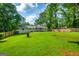 Expansive backyard with a well-maintained lawn, ideal for recreation and relaxation at 120 Lakeside Dr, Ellenwood, GA 30294