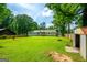 Large, grassy backyard, perfect for outdoor activities at 120 Lakeside Dr, Ellenwood, GA 30294