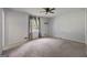A serene bedroom with carpet and a neutral color scheme at 120 Lakeside Dr, Ellenwood, GA 30294
