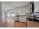 Efficient kitchen featuring stainless steel appliances and lots of natural light at 120 Lakeside Dr, Ellenwood, GA 30294