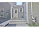 Back entrance with a cozy porch and modern siding at 100 Smokerise Trce, Peachtree City, GA 30269
