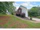 Well-maintained home with brick and siding, features a lush yard and driveway at 634 Skyline Dr, Villa Rica, GA 30180