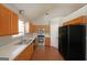 Functional kitchen with stainless steel appliances, ample counter space and wood cabinets at 634 Skyline Dr, Villa Rica, GA 30180