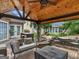 Gazebo featuring outdoor seating, fan, wooden ceiling, and brick flooring at 141 Wexford Ct, Stockbridge, GA 30281