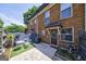 Cozy brick townhouse backyard with a small patio, outdoor seating, and a touch of greenery at 105 N River Dr # G, Sandy Springs, GA 30350