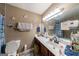 Functional bathroom with a spacious vanity and a standard toilet, providing essential amenities at 105 N River Dr # G, Sandy Springs, GA 30350