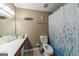 This bathroom offers a standard toilet, and a tiled shower, ideal for a functional and comfortable experience at 105 N River Dr # G, Sandy Springs, GA 30350