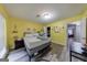Cozy bedroom featuring hardwood floors, neutral walls, and comfortable bed arrangement at 105 N River Dr # G, Sandy Springs, GA 30350