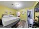 Sunny bedroom boasts sleek wood flooring and a modern bed frame, exuding a clean and cozy ambiance at 105 N River Dr # G, Sandy Springs, GA 30350