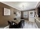 The dining area has modern decor, and an access door to the outside at 105 N River Dr # G, Sandy Springs, GA 30350