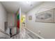 Bright hallway with hardwood floors leading to bedrooms and other living areas of the home at 105 N River Dr # G, Sandy Springs, GA 30350