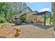 Inviting backyard patio with an outdoor grill and ample seating, great for entertaining guests at 460 Morgan Mill Rd, Brooks, GA 30205