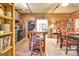 Open-concept kitchen featuring wooden cabinetry, an island, and a seamless flow to the dining area at 460 Morgan Mill Rd, Brooks, GA 30205