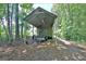 Open outbuilding structure featuring a trailer and ladder to provide covered storage space at 460 Morgan Mill Rd, Brooks, GA 30205