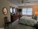 Bedroom with carpet, dresser with mirrors, a ceiling fan and natural light at 529 Valley Woods Se Cir, Conyers, GA 30094