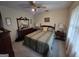 Comfortable bedroom with carpet, ceiling fan and natural light from the window at 529 Valley Woods Se Cir, Conyers, GA 30094