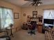 Bright bedroom with a desk and comfortable seating at 529 Valley Woods Se Cir, Conyers, GA 30094
