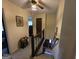 Second story hallway and staircase with carpet, painted walls and wooden railings at 529 Valley Woods Se Cir, Conyers, GA 30094