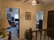 Upstairs hallway with open doorways to other rooms in the house at 529 Valley Woods Se Cir, Conyers, GA 30094