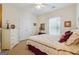 Bright bedroom with natural light, double closet, and complementing decor for a relaxing space at 119 Holiday Road, Unit 301 Rd # 301, Buford, GA 30518