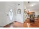 Inviting entryway with decorative glass door, hardwood flooring, and dining room access at 119 Holiday Road, Unit 301 Rd # 301, Buford, GA 30518