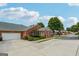 Charming brick house with an attached garage and a well-maintained lawn in a beautiful neighborhood at 119 Holiday Road, Unit 301 Rd # 301, Buford, GA 30518