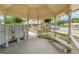 Mail center with mailboxes, community information board, and benches under gazebo at 119 Holiday Road, Unit 301 Rd # 301, Buford, GA 30518