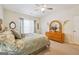 Comfortable main bedroom features carpeted floors, large window, and dressing mirror at 119 Holiday Road, Unit 301 Rd # 301, Buford, GA 30518