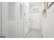Practical mud room entry area with tile floors and functional storage solutions for organization at 119 Holiday Road, Unit 301 Rd # 301, Buford, GA 30518