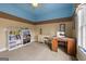 Bedroom featuring desk, window, and ample storage at 172 Sam Solomon Rd, Locust Grove, GA 30248